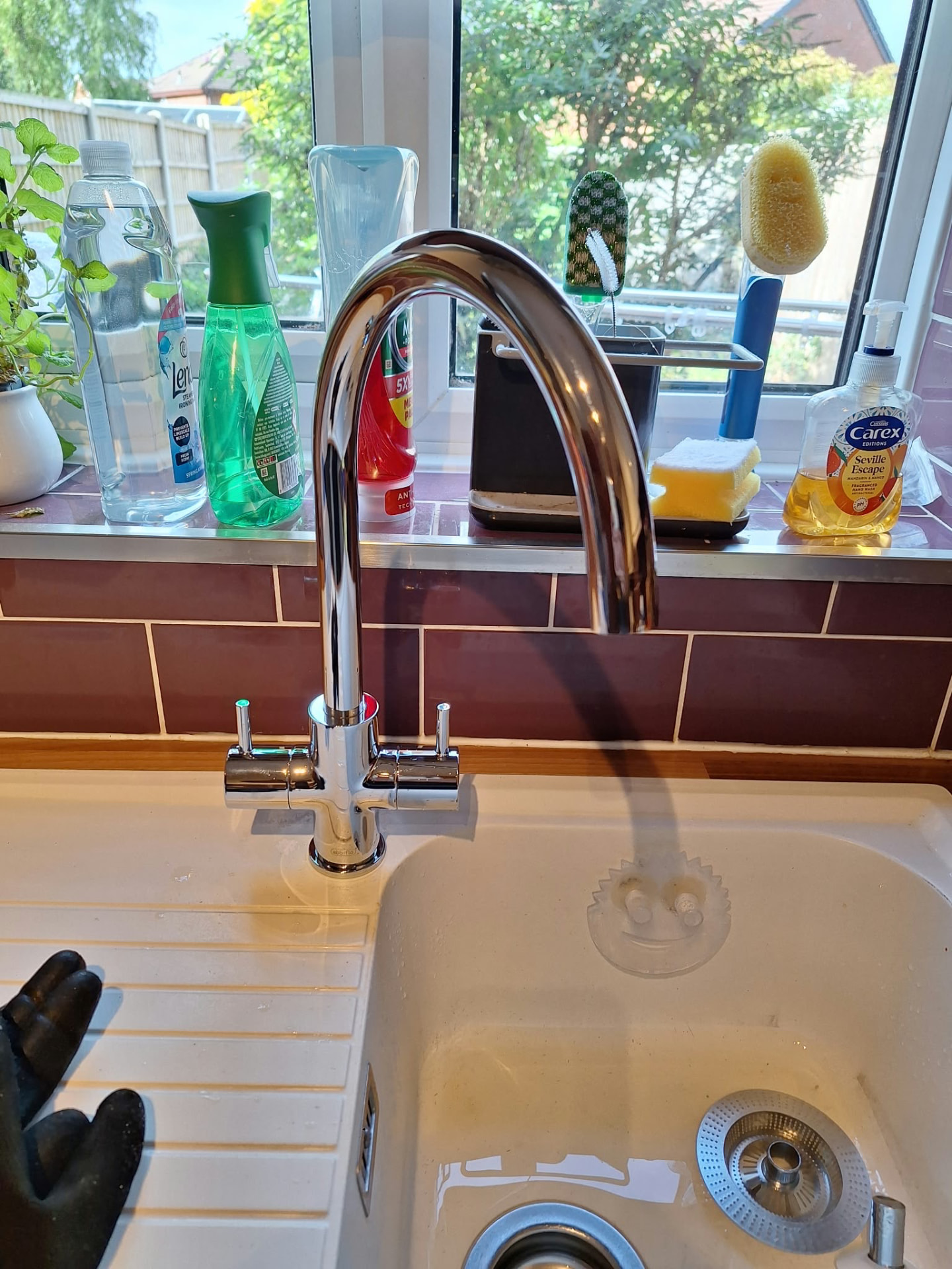 New chrome kitchen tap fitted